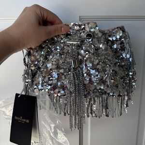 Rich Radi Q’s sequin & beaded bucket handbag
